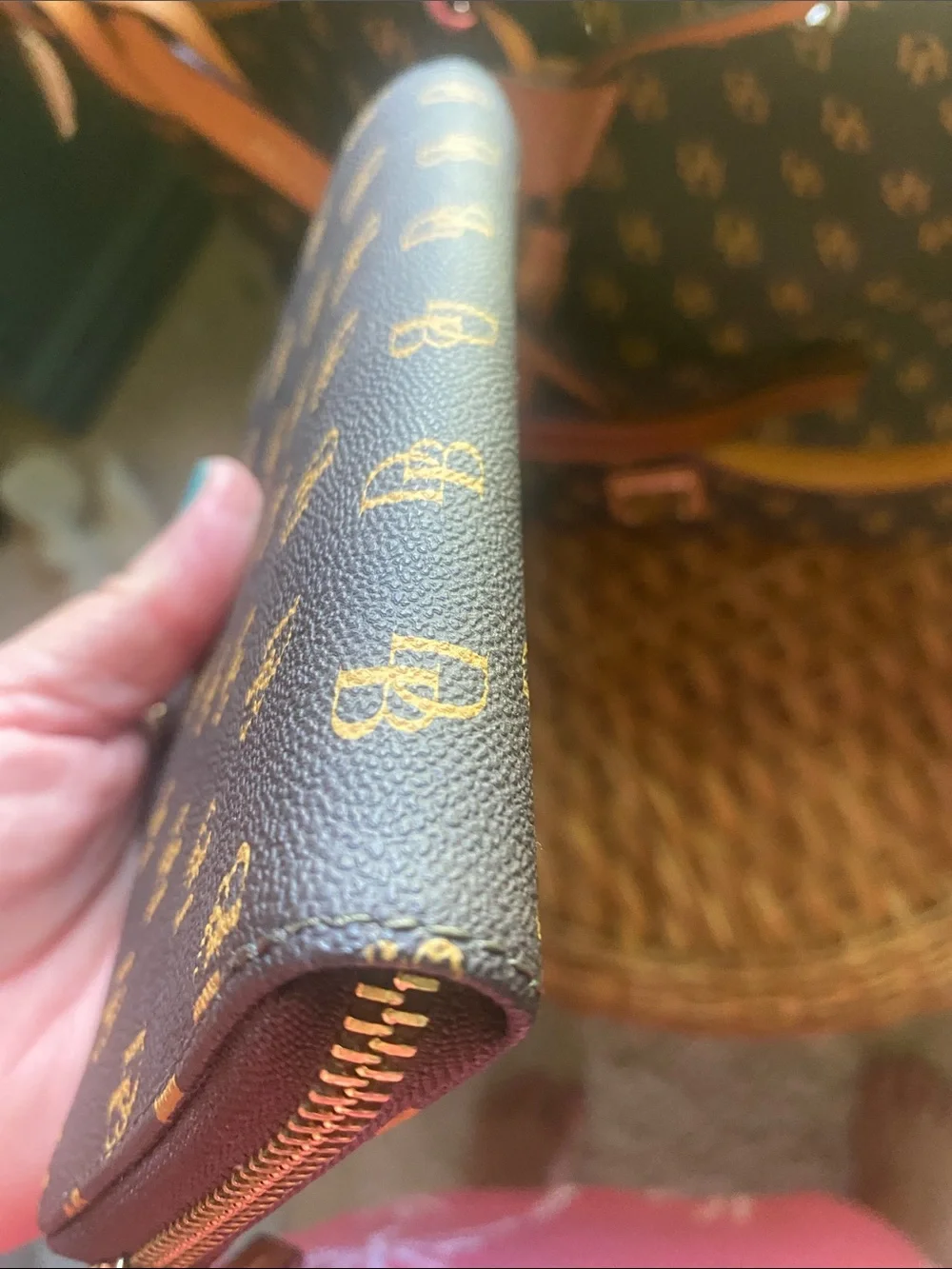 Dooney & Bourke dark brown and Gold Monogram Wristlet